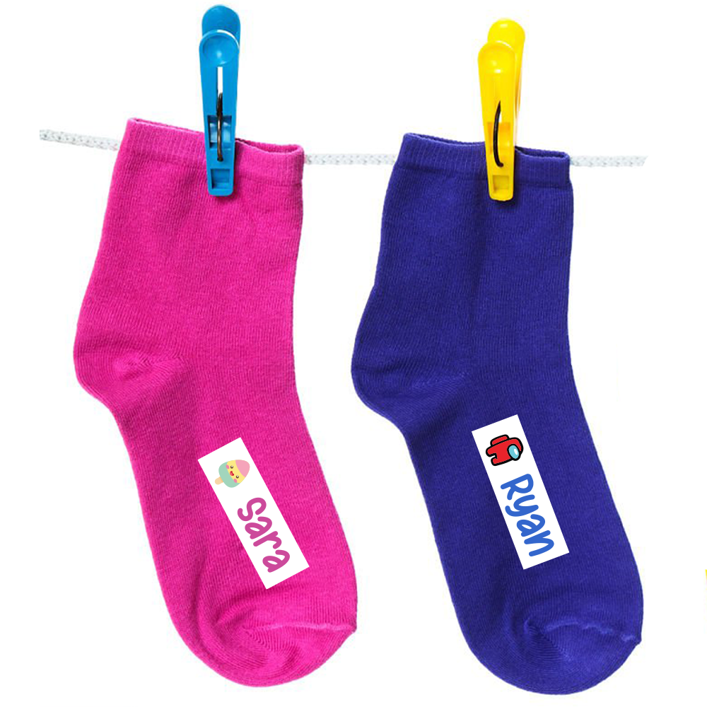 Happy school girl wearing uniform with personalized iron-on clothing labels, durable name tags for kids clothes