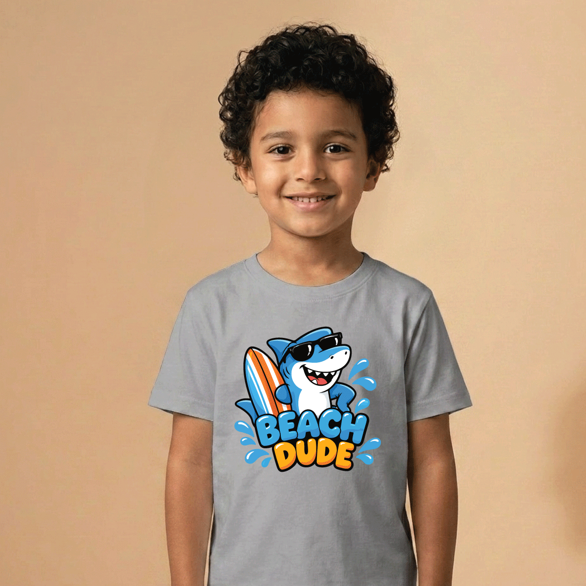 Boy wearing the Beach Dude kids T-shirt