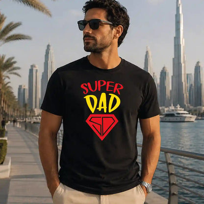Black t-shirt featuring a bold “Super Dad” design, soft cotton casual tee for fathers, perfect Father’s Day gift, dad appreciation gift, and everyday wear in the UAE.