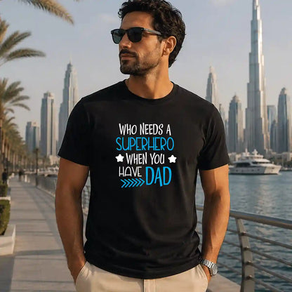 Black t-shirt featuring a “Superhero Dad” graphic print, comfortable cotton casual wear for fathers, ideal gift for dads, Father’s Day, and everyday lifestyle use in the UAE.