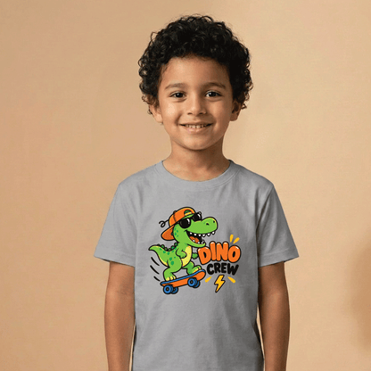 Boy modeling the Dino Crew dinosaur skateboard kids T-shirt